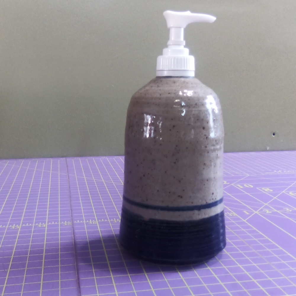 Artist signed pottery soap dispenser